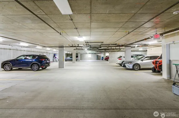 a view of parking space with parked cars