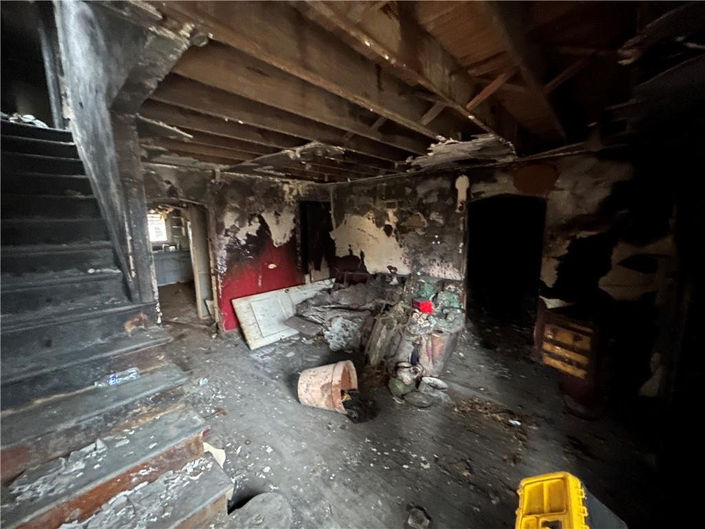 1832 South Eighty Eight Road Greensboro, PA 15338 - Photo 12 of 21 a view of empty room with wooden floor