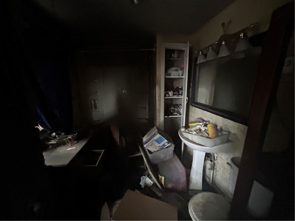 1832 South Eighty Eight Road Greensboro, PA 15338 - Photo 21 of 21 a living room with furniture and a flat screen tv