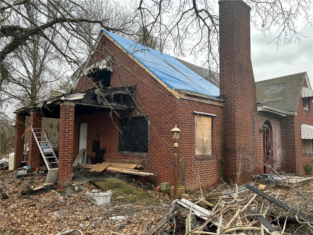 1832 South Eighty Eight Road Greensboro, PA 15338 - Photo 4 of 21 a view of a house with a yard