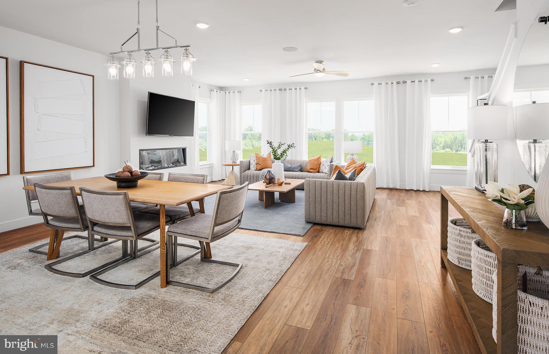 3510 Tidal Marsh Way Laurel, MD 20724 - Photo 10 of 33 a living room with furniture and a flat screen tv