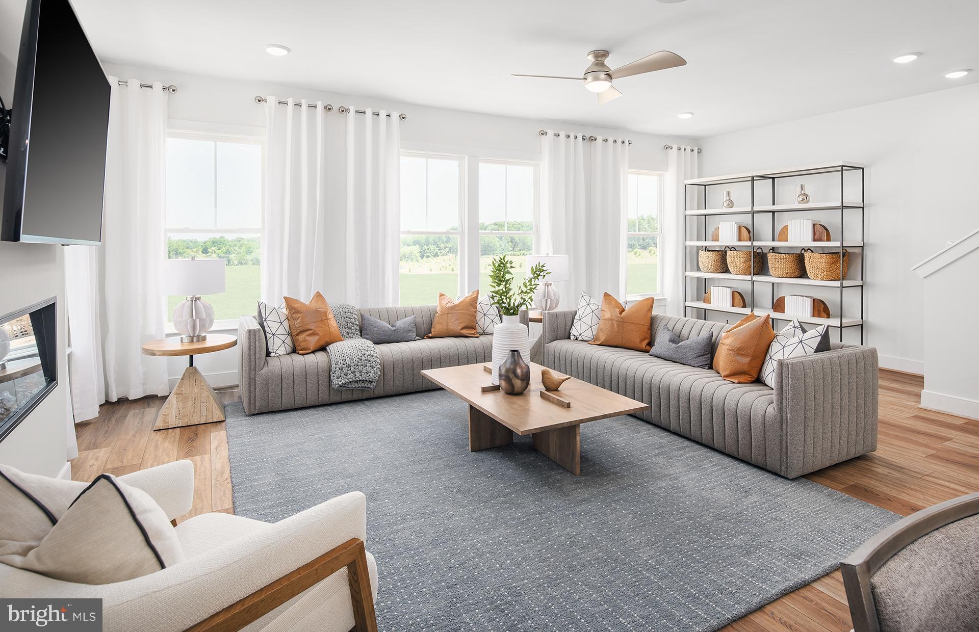 3510 Tidal Marsh Way Laurel, MD 20724 - Photo 7 of 33 a living room with furniture and a flat screen tv