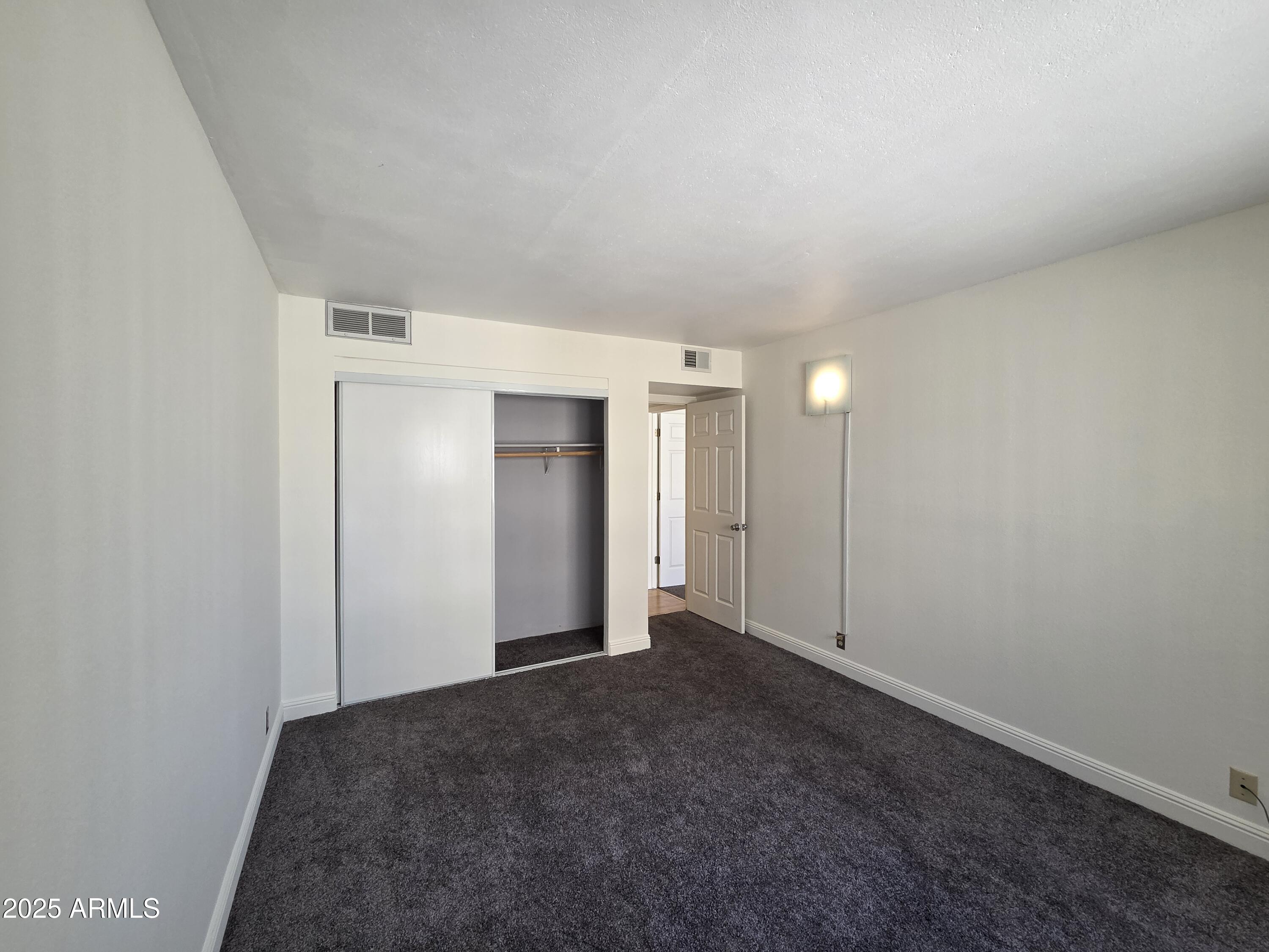 7920 East Camelback Road, Unit 408 Scottsdale, AZ 85251 - Photo 13 of 18 a view of an empty room
