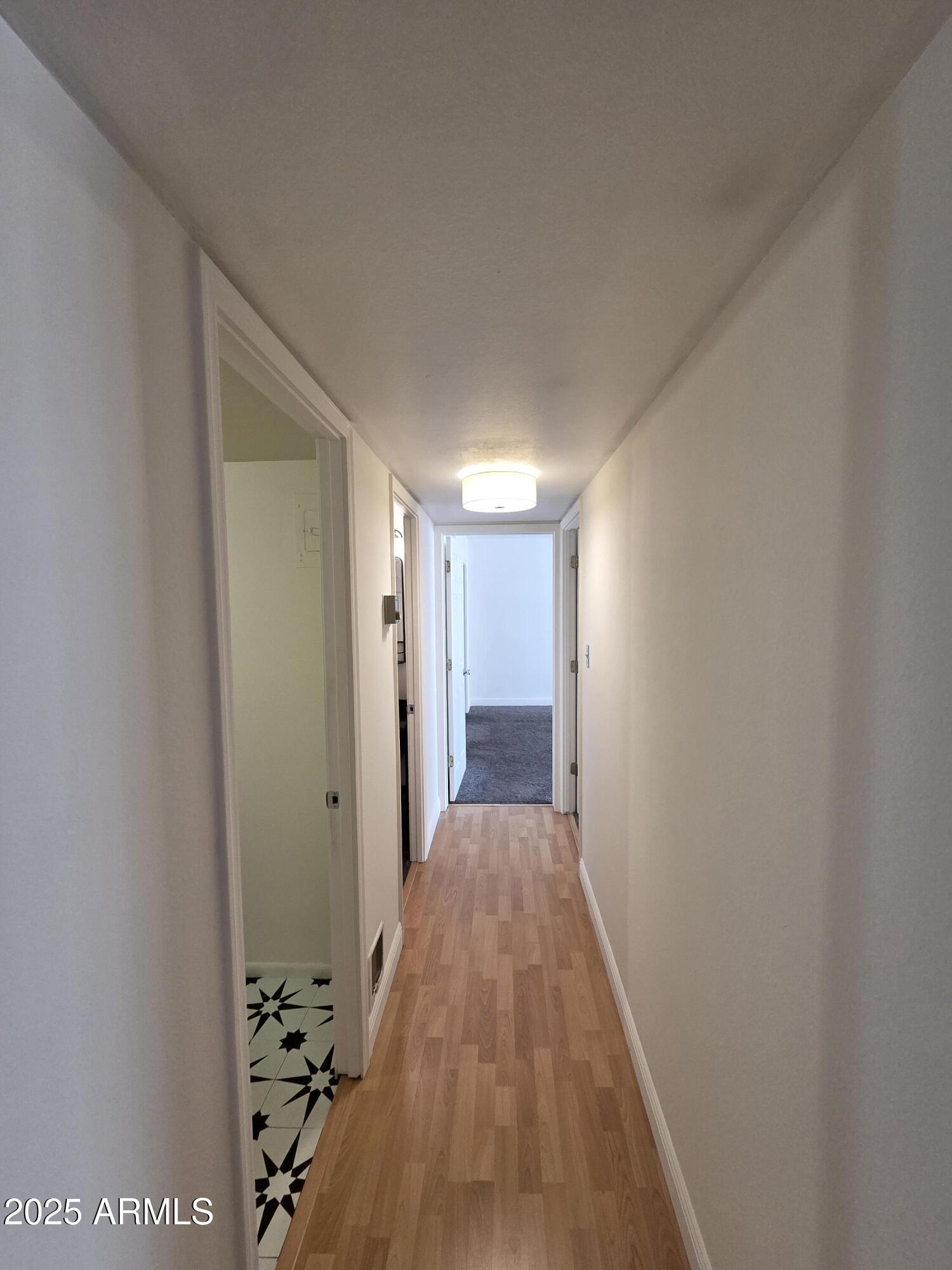 7920 East Camelback Road, Unit 408 Scottsdale, AZ 85251 - Photo 9 of 18 a view of a hallway