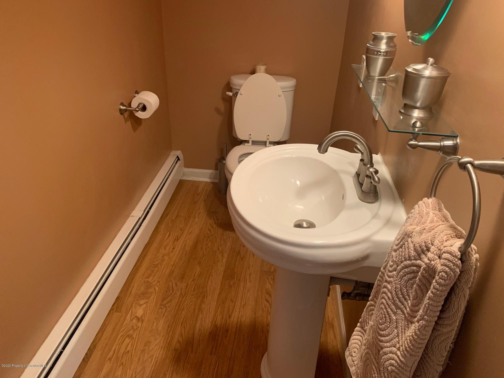 1094 Rutter Avenue Kingston, PA 18704 - Photo 22 of 35 a bathroom with a sink and mirror