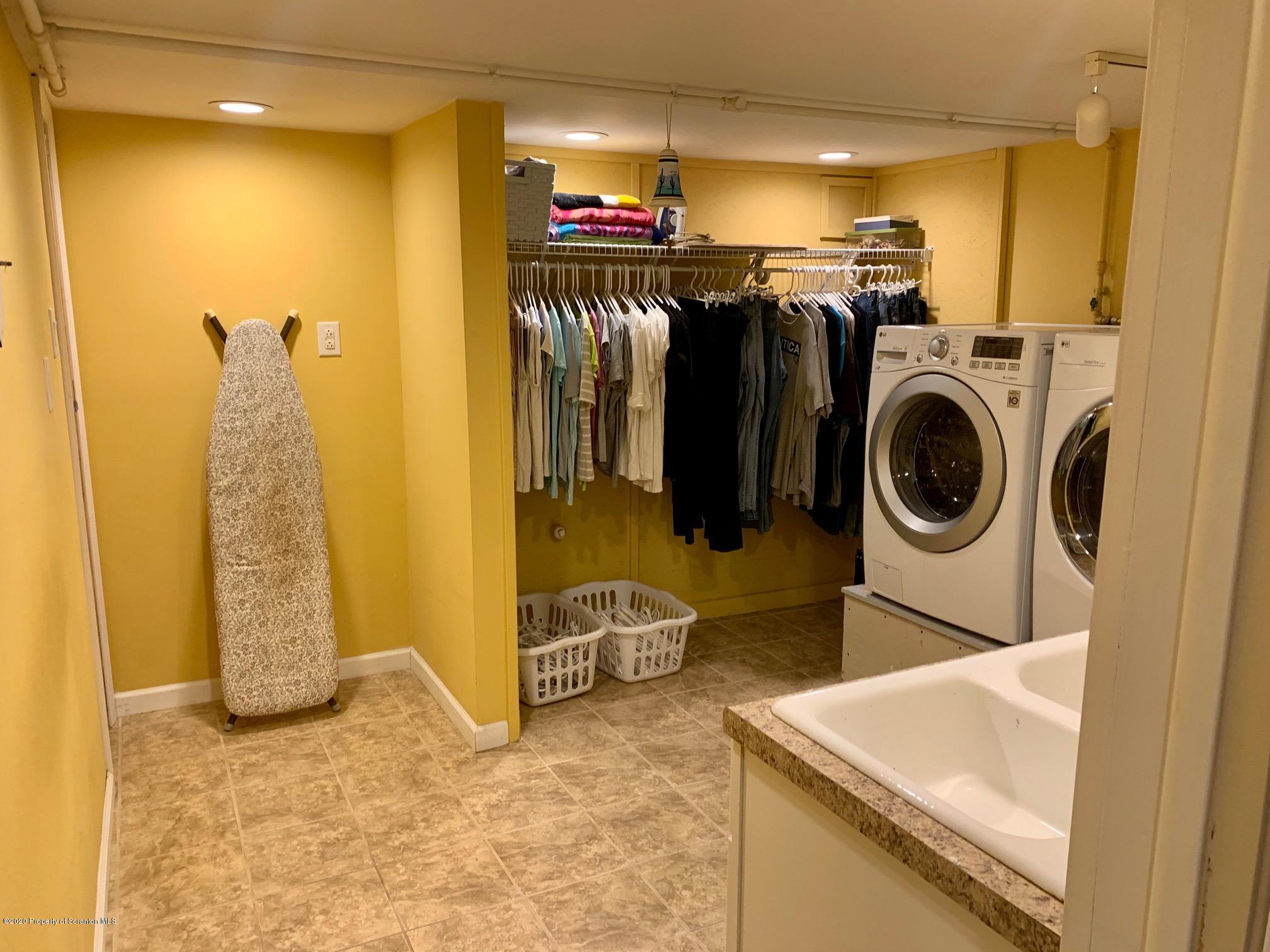 1094 Rutter Avenue Kingston, PA 18704 - Photo 29 of 35 a view of a storage and utility room with washer and dryer