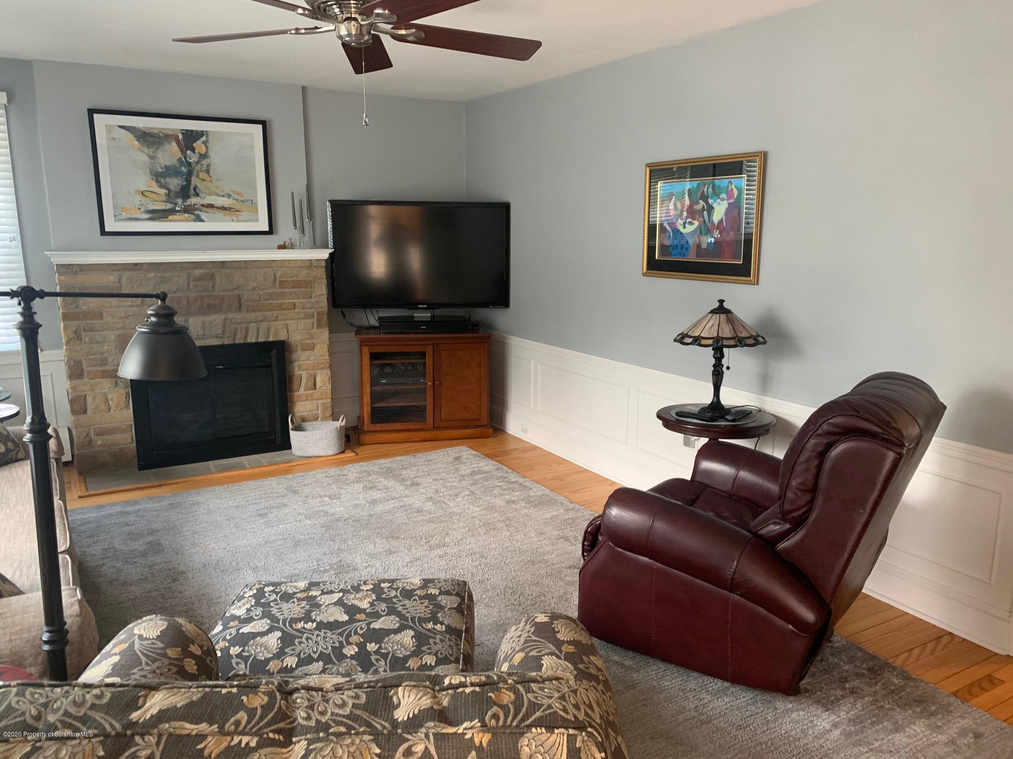 1094 Rutter Avenue Kingston, PA 18704 - Photo 3 of 35 a living room with furniture and a flat screen tv