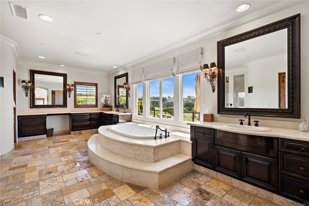5 Via Monarca Street Dana Point, CA 92629 - Photo 23 of 64 a spacious bathroom with a double vanity sink tub and mirror