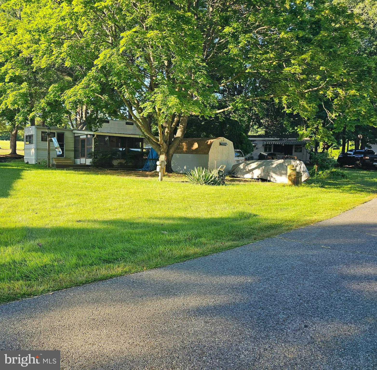 15-16 Hiawatha Drive, Unit GLEN 6 Earleville, MD 21919 - Photo 1 of 11 a house view with swimming pool in front of it