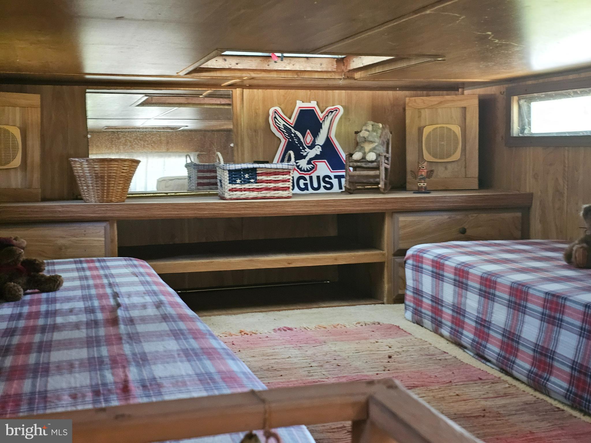 15-16 Hiawatha Drive, Unit GLEN 6 Earleville, MD 21919 - Photo 10 of 11 a bedroom with a bed and painting on the wall