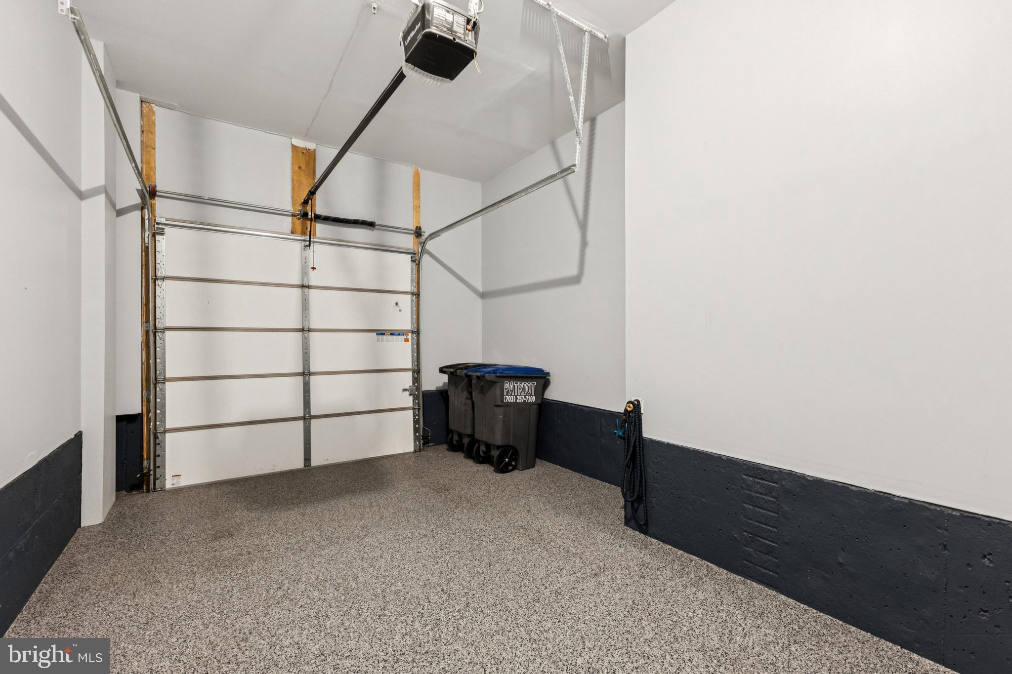 4635 Charger Place, Unit 805 Chantilly, VA 20151 - Photo 38 of 41 1-car garage with epoxy floor