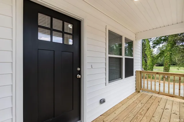 a view of wooden balcony and wooden floor
