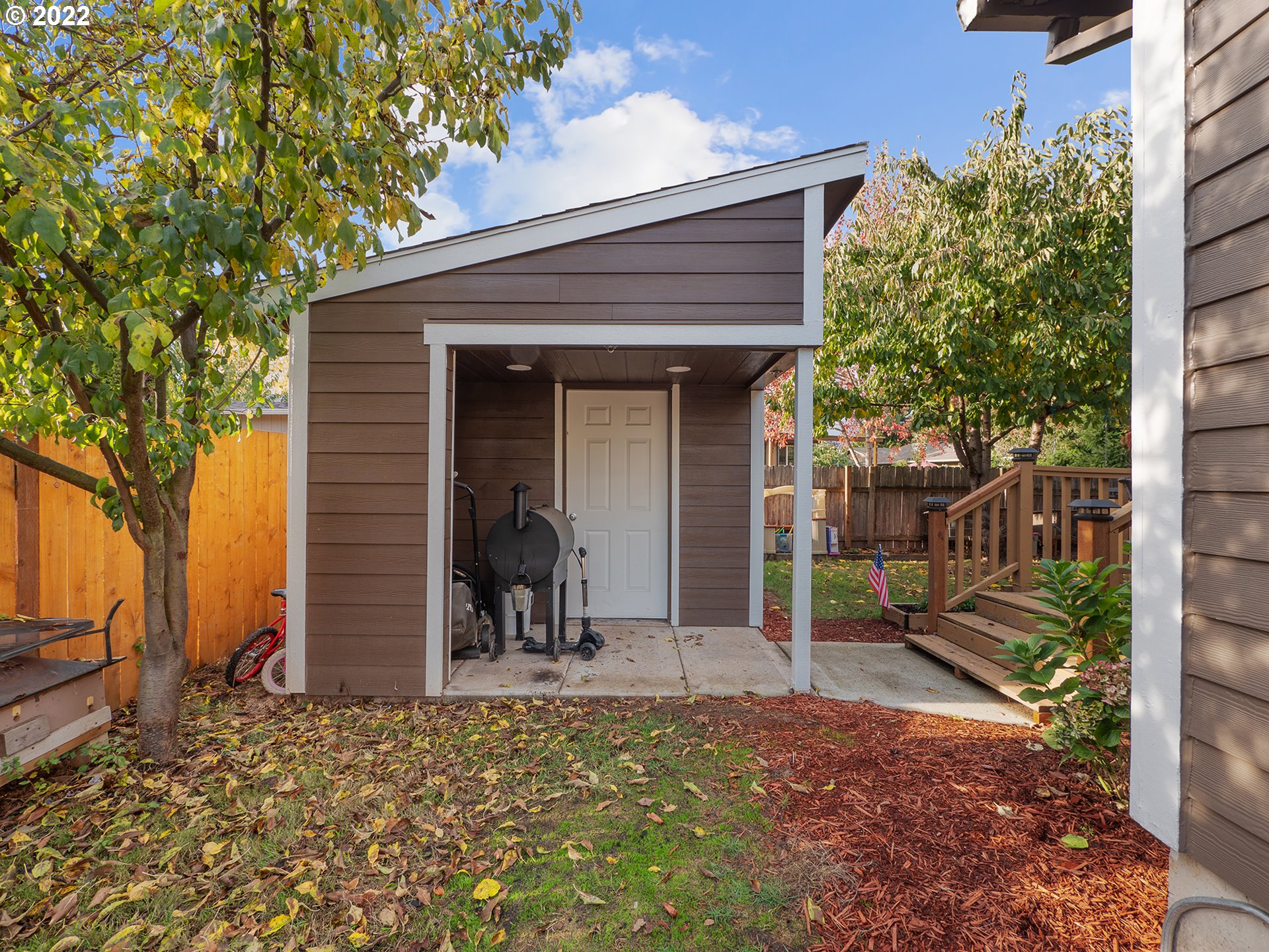 795 Brown Street Woodburn, OR 97071 - Photo 30 of 30 a view of a house with a patio