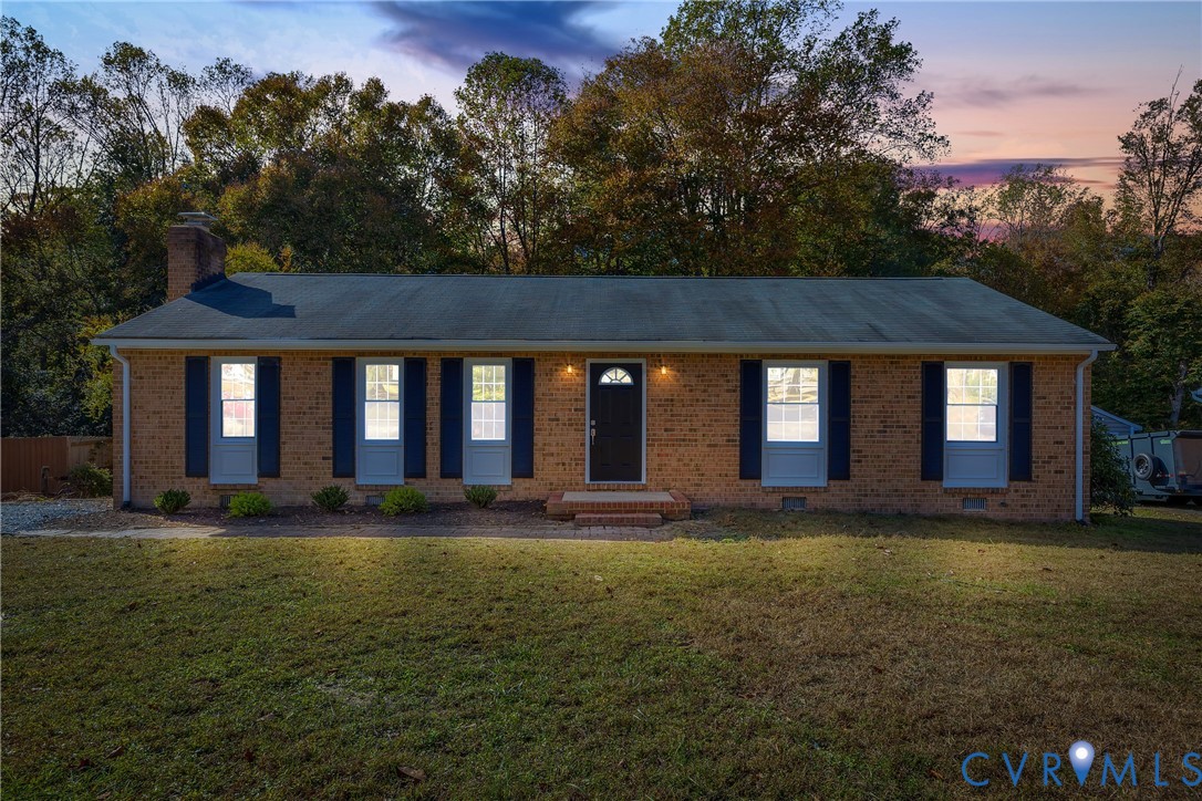9099 Mossy Brook Road Mechanicsville, VA 23116 - Photo 2 of 29 a view of house with yard and outdoor seating