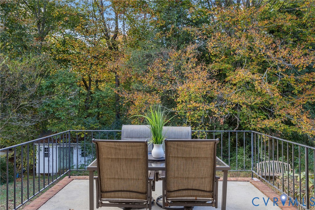 9099 Mossy Brook Road Mechanicsville, VA 23116 - Photo 25 of 29 a view of a chairs and table on the deck