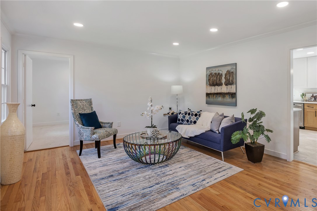 9099 Mossy Brook Road Mechanicsville, VA 23116 - Photo 5 of 29 a living room with furniture and a wooden floor