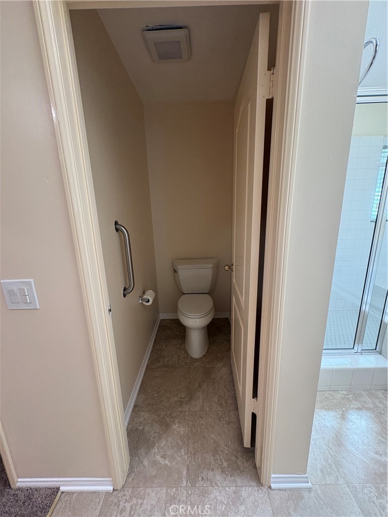 7149 Rockspring Lane Highland, CA 92346 - Photo 16 of 29 Primary Toilet closet
