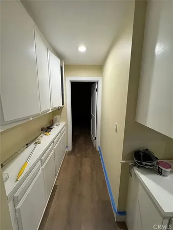 a bathroom with a shower and a sink