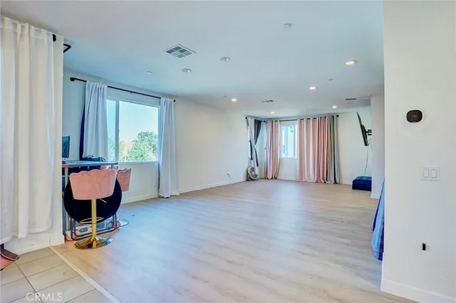 a view of a livingroom with a flat screen tv