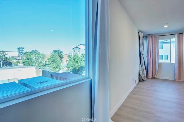 a kitchen with stainless steel appliances kitchen island granite countertop a refrigerator and a stove top oven