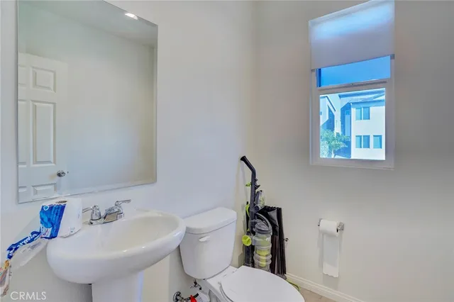 a bathroom with a sink and mirror