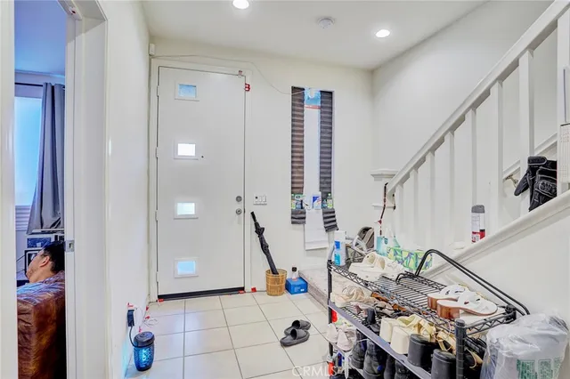 a view of entryway with stairs and furniture