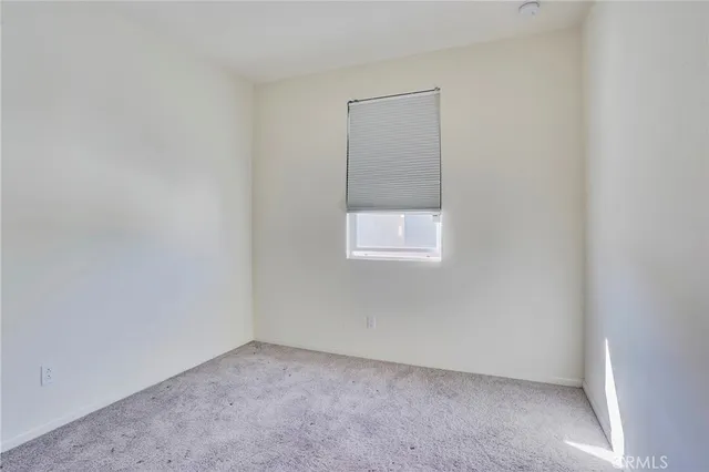 an empty room with mirror