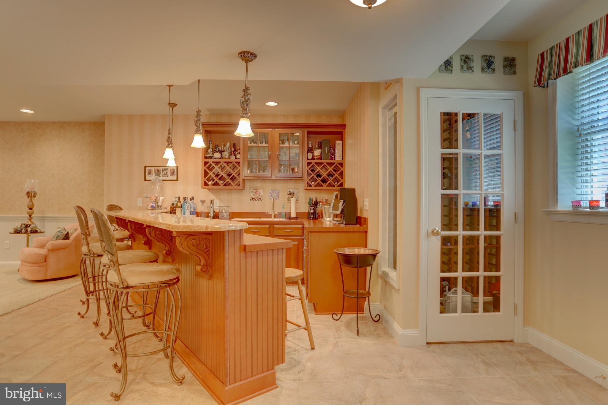 16 Deerfield Road Lancaster, PA 17603 - Photo 33 of 56 Bar and wine closet in basement