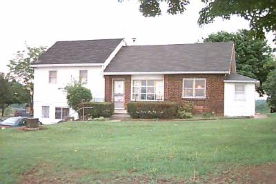 1444 Bangor Road Nazareth, PA 18064 - Photo 1 of 1 a front view of house with yard and green space