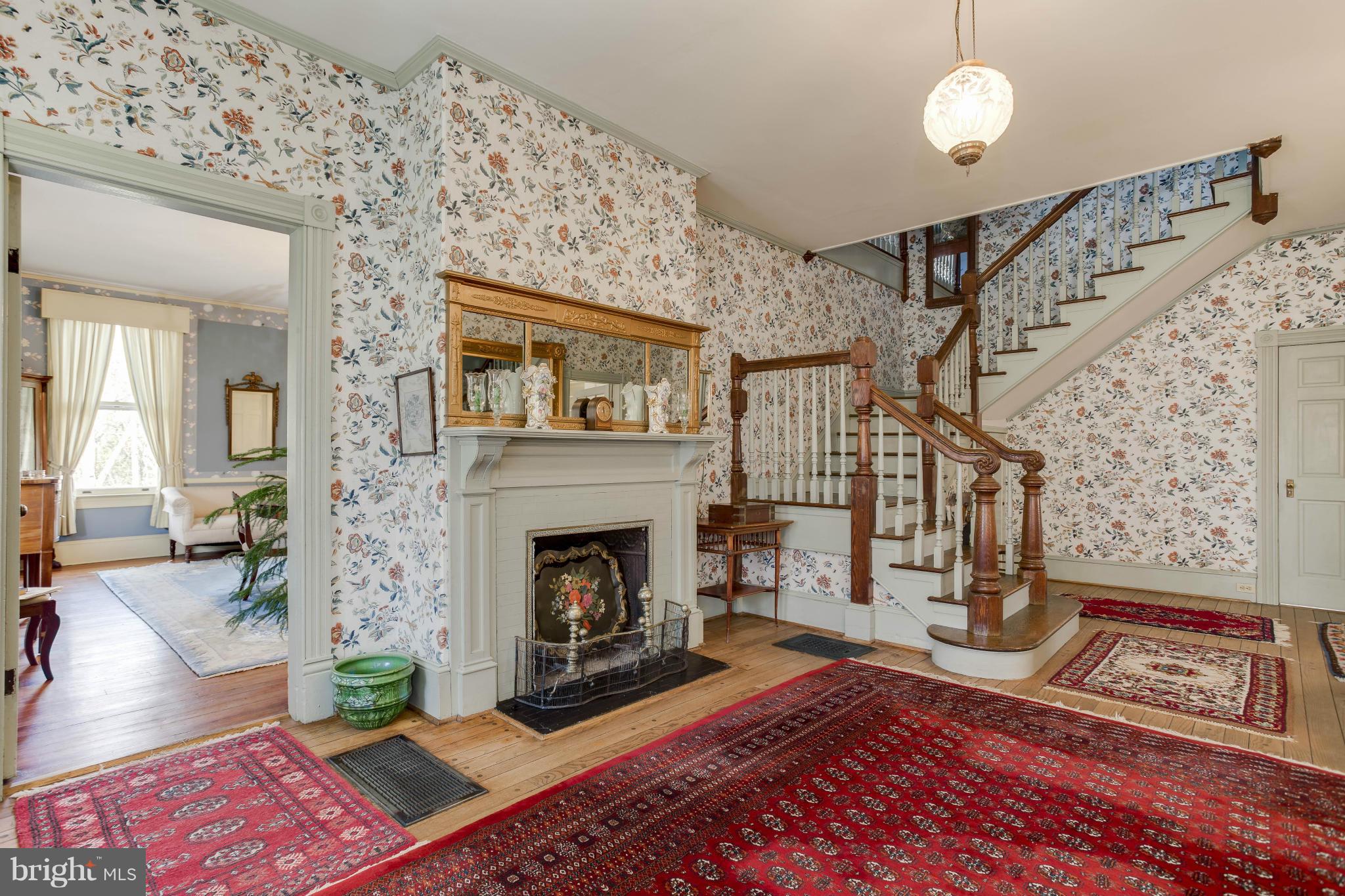 403 Gun Road Baltimore, MD 21227 - Photo 7 of 29 The Foyer Even Has a Fireplace
