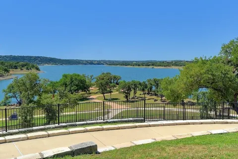 a view of a lake with a outdoor space