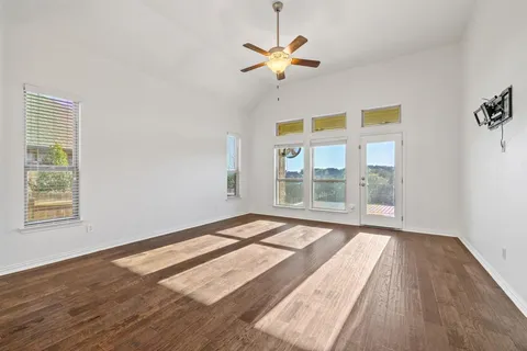 a living room with furniture and fireplace