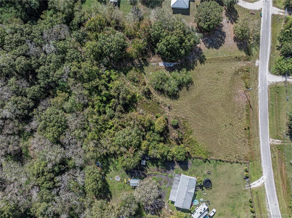 17510 Northwest 38th Avenue Okeechobee, FL 34972 - Photo 6 of 11 an aerial view of a house with a yard