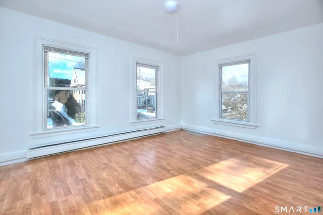 an empty room with windows