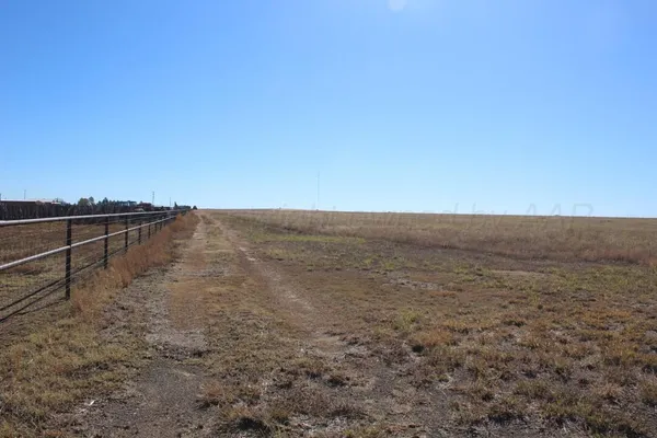 a view of an ocean beach and mountain