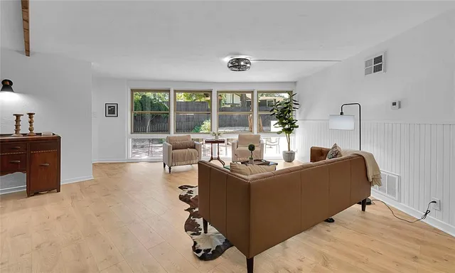 a view of a living room and furniture