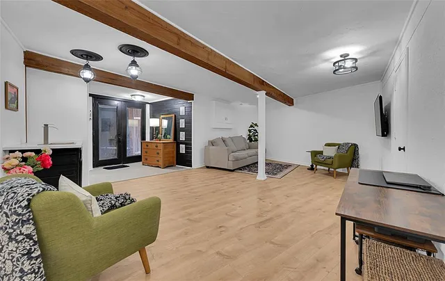 a living room with a couch and a flat screen tv