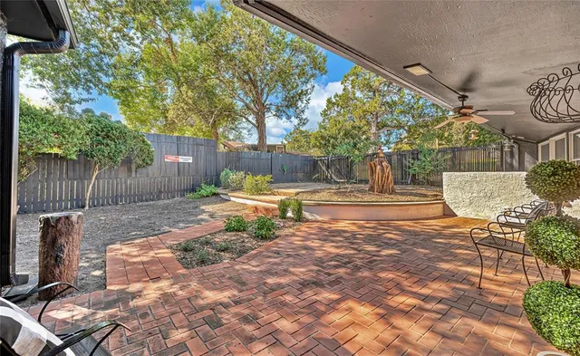 a view of a yard with patio