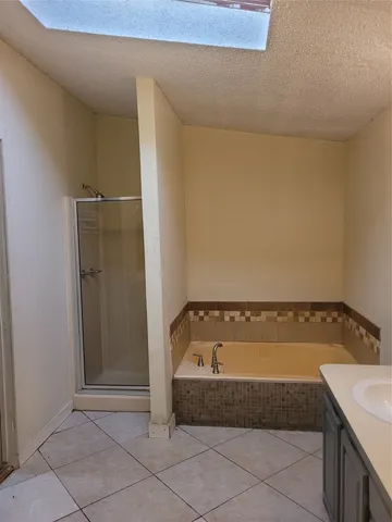a bathroom with a bath tub