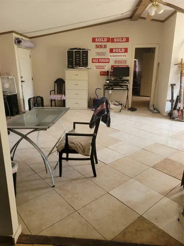 a view of a workspace with furniture