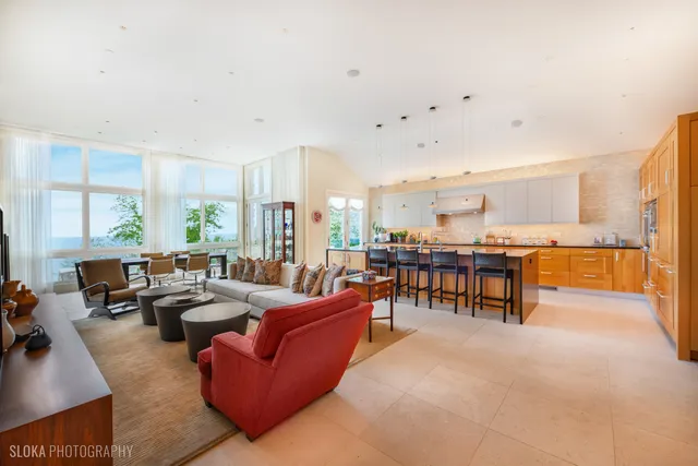 a living room with furniture and a table