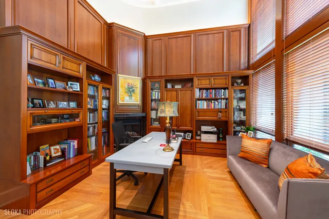 a spacious bathroom with a sink and a mirror