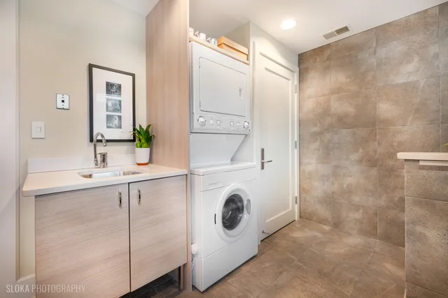 a utility room with dryer and washer