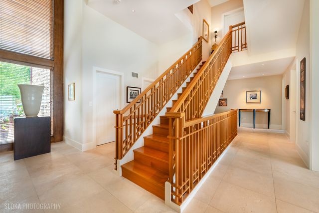 a bedroom with furniture and a fireplace