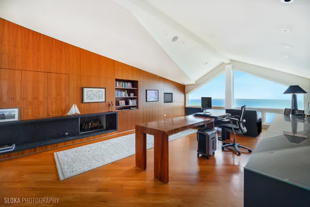 a kitchen with stainless steel appliances granite countertop a refrigerator and stove