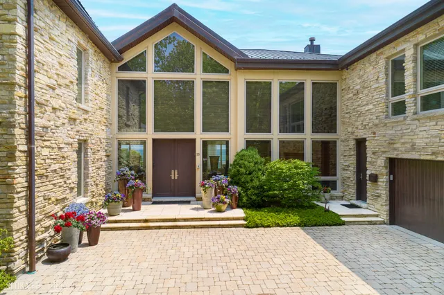 a front view of a house having yard