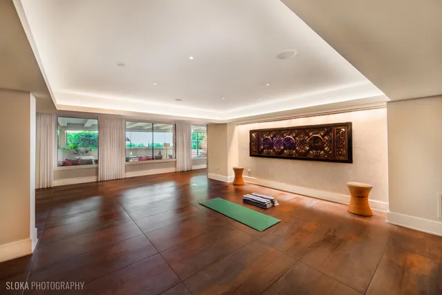 a bathroom with a sink a mirror and a bathtub