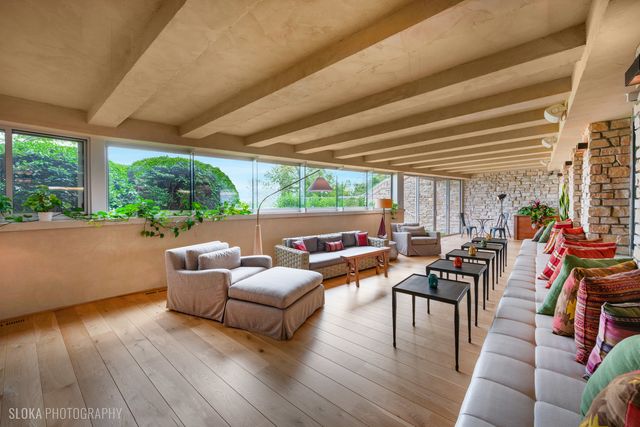 a view of a garden with an outdoor space