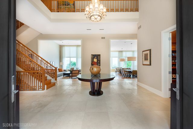 a view of living room with furniture and wooden floor