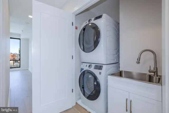 a close view of utility and a sink in a kitchen